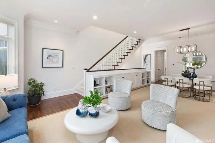 Living and dining spaces at 1911-B Vallejo Street beside the open staircase