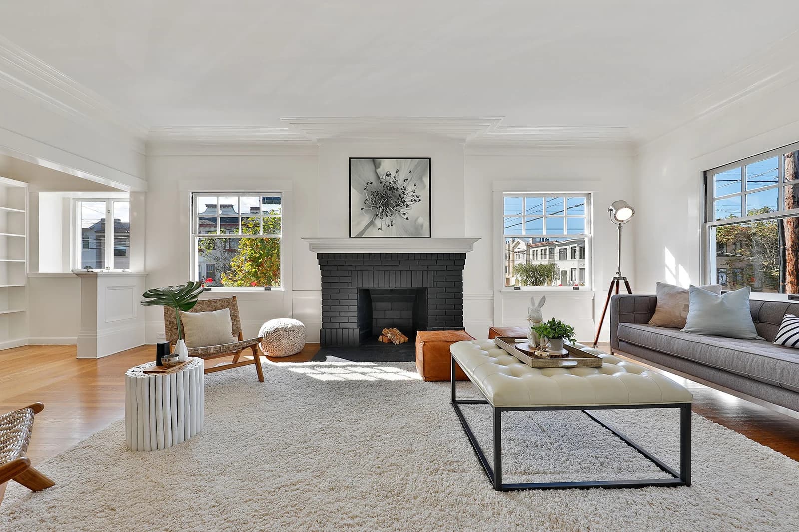 Bright living room with a black fireplace at 5550 California Street